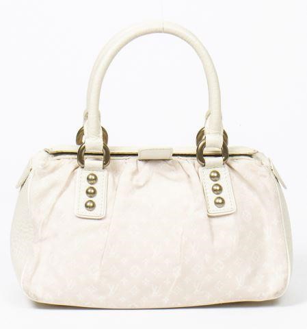 Appraisal: Louis Vuitton Trapeze hand bag in monogram Idylle canvas ivory