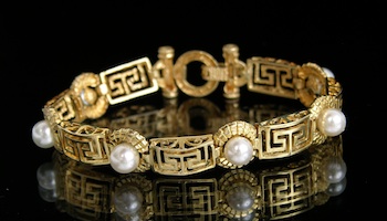 Appraisal: A Greek Key Motif Gold Bracelet with Pearls k yellow