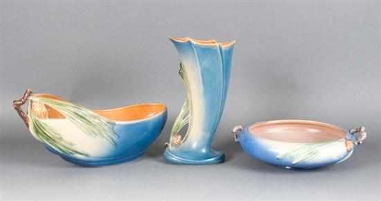 Appraisal: Three Roseville art pottery vases in the ''Blue Pinecone'' pattern