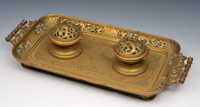 Appraisal: Cast brass inkstandof rectangular form with pierced and relief decoration