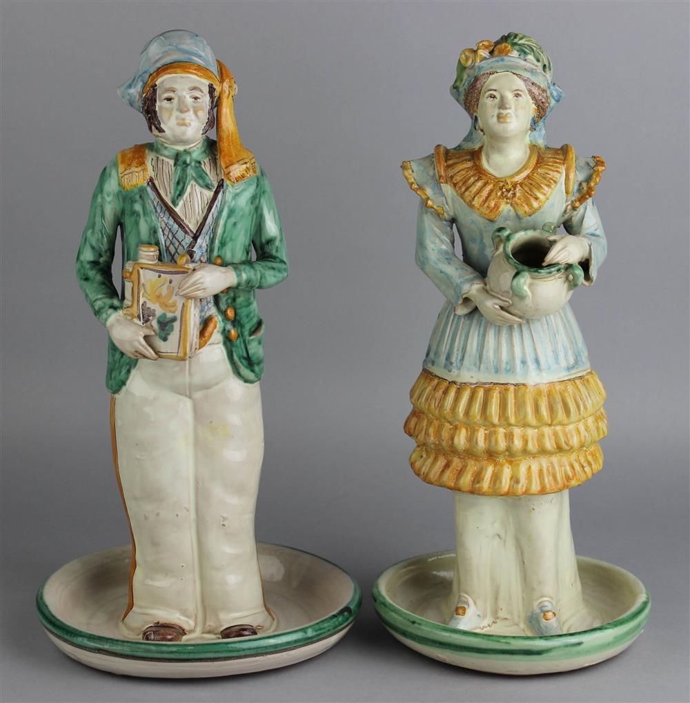 Appraisal: TWO MODERN CALTAGIRONE MAIOLICA FIGURES black Alessi Caltagirone under bases