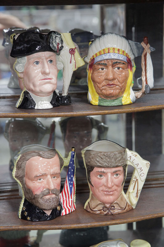 Appraisal: FOUR ROYAL DOULTON ANTAGONISTS' COLLECTION CHARACTER MUGS Davy Crockett Antonio