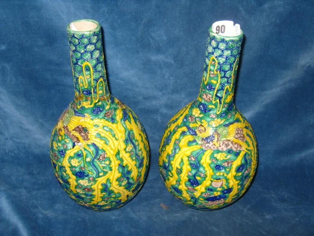 Appraisal: A pair of late th century Japanese green ground vases