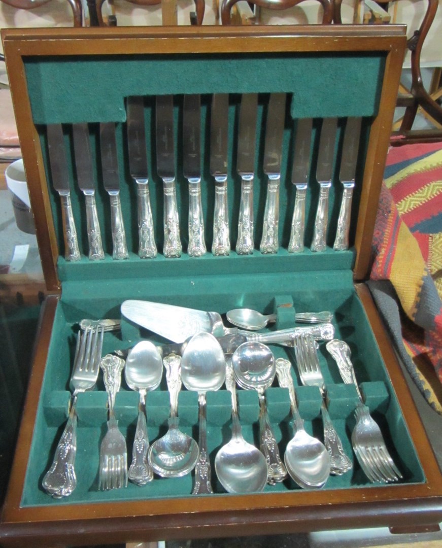 Appraisal: A canteen of silver plated cutlery in a mahogany case