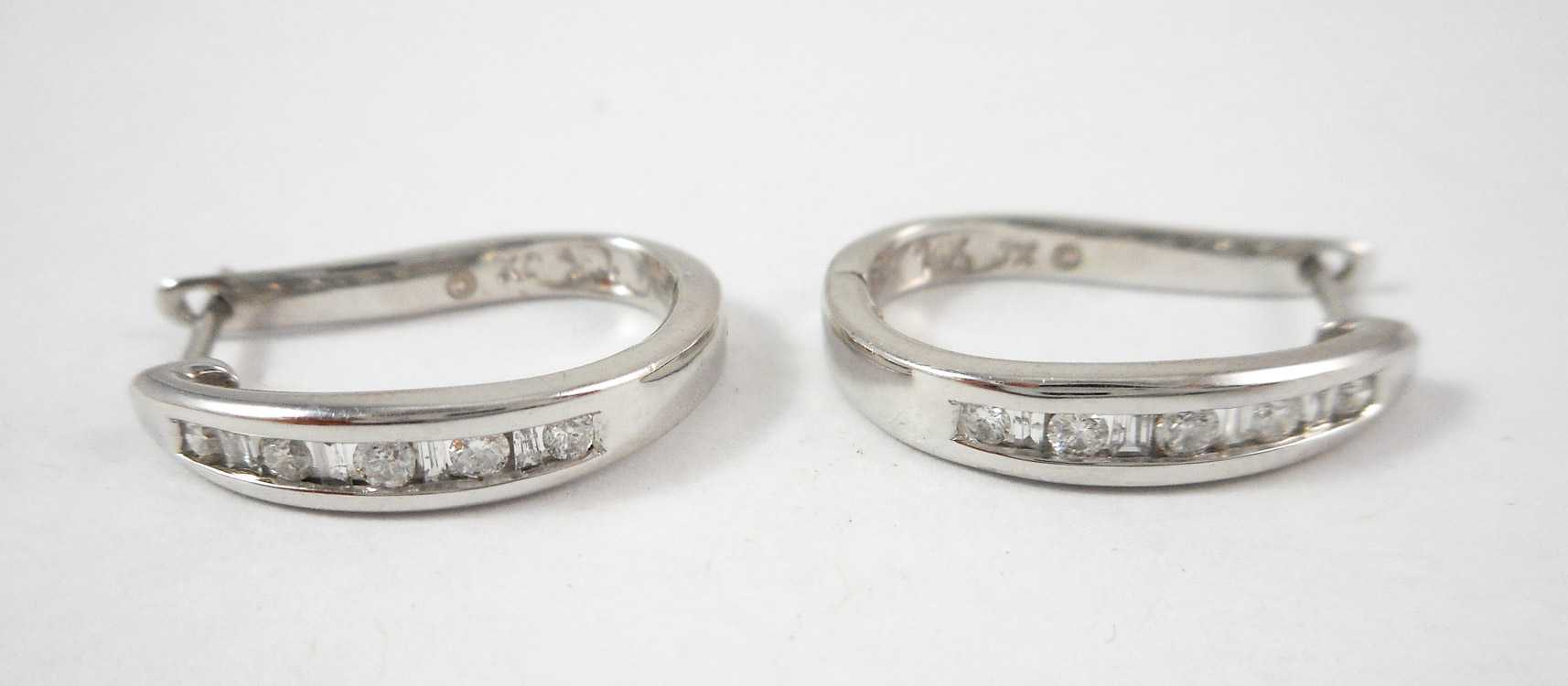 Appraisal: PAIR OF DIAMOND AND WHITE GOLD EARRINGS each k white