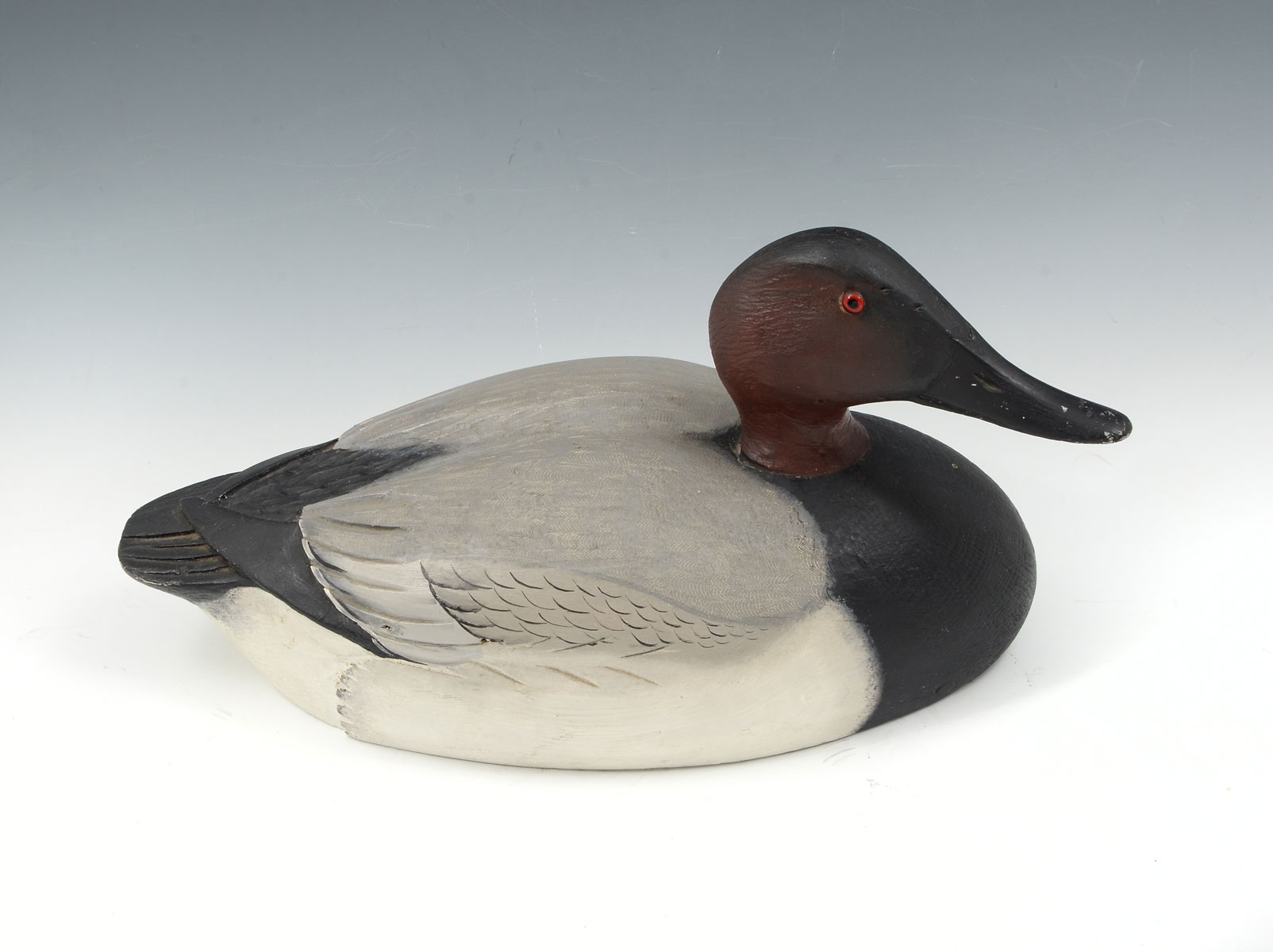 Appraisal: ELMER CROWELL CARVED DUCK DECOY Carved painted Redhead duck decoy