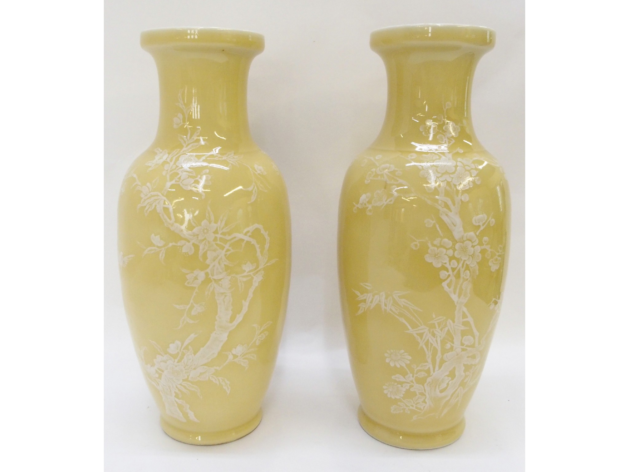 Appraisal: Pair of Chinese yellow ground vases drilled to underside