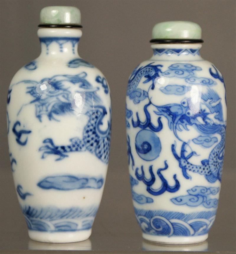 Appraisal: Cylindrical porcelain snuff bottles with blue underglaze dragon seeking flaming