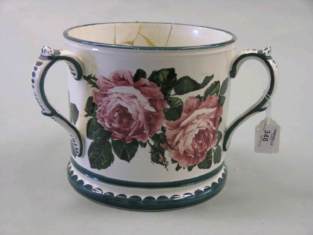 Appraisal: A large Wemyss Ware three handled mug tyg cylindrical shape