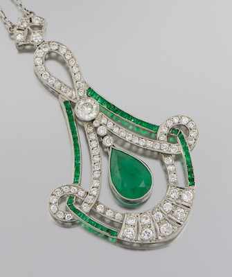 Appraisal: A Platinum Diamond and Emerald Necklace Platinum pendant of graceful