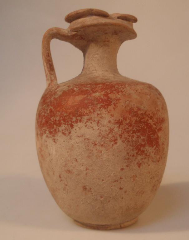 Appraisal: A Roman Eastern Sigillata single handled flagon the light orange