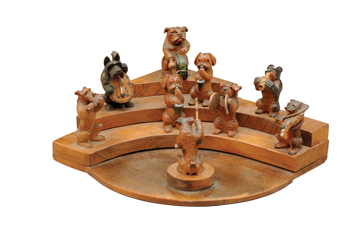 Appraisal: CARVED AND PAINTED WOODEN NINE PIECE DOG BAND ON A