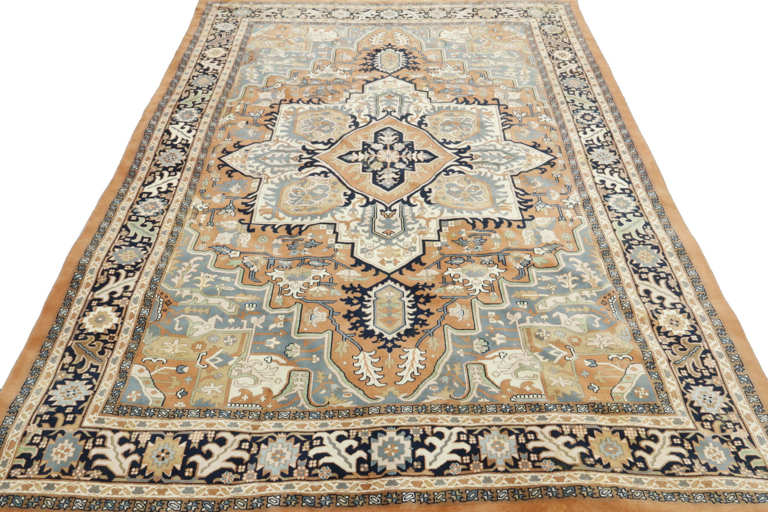 Appraisal: INDO-HERIZ CARPET Large square gabled medallion in peach teal ivory