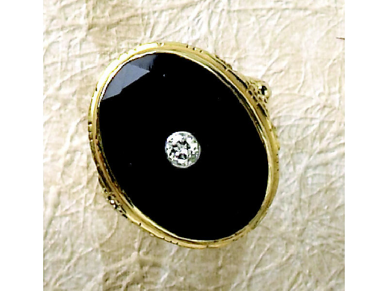 Appraisal: ONYX AND DIAMOND RING k yellow gold lady's ring with