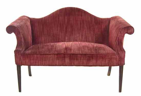 Appraisal: A Chippendale Style Camelback Settee of typical form with everted