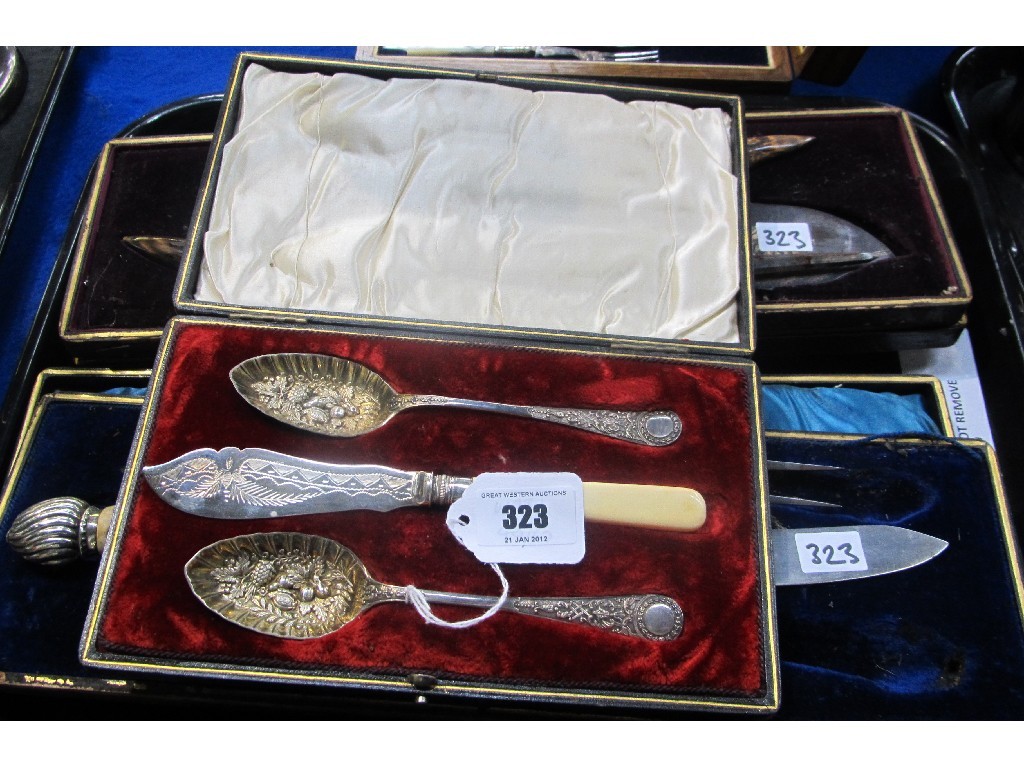 Appraisal: Lot comprising two cased carving sets and a cased pair