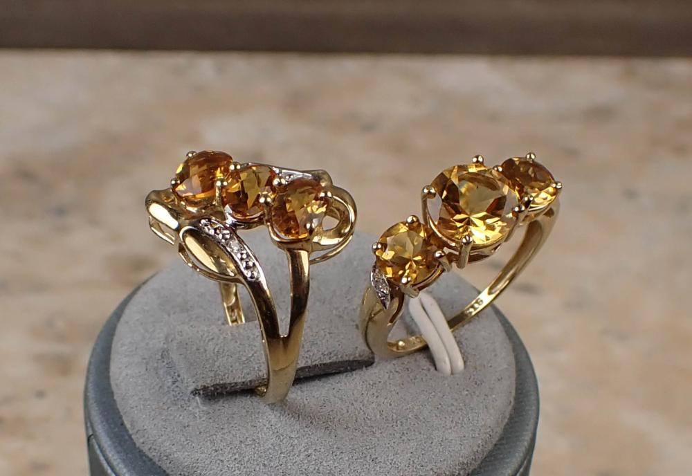 Appraisal: TWO CITRINE DIAMOND AND YELLOW GOLD RINGS including a k