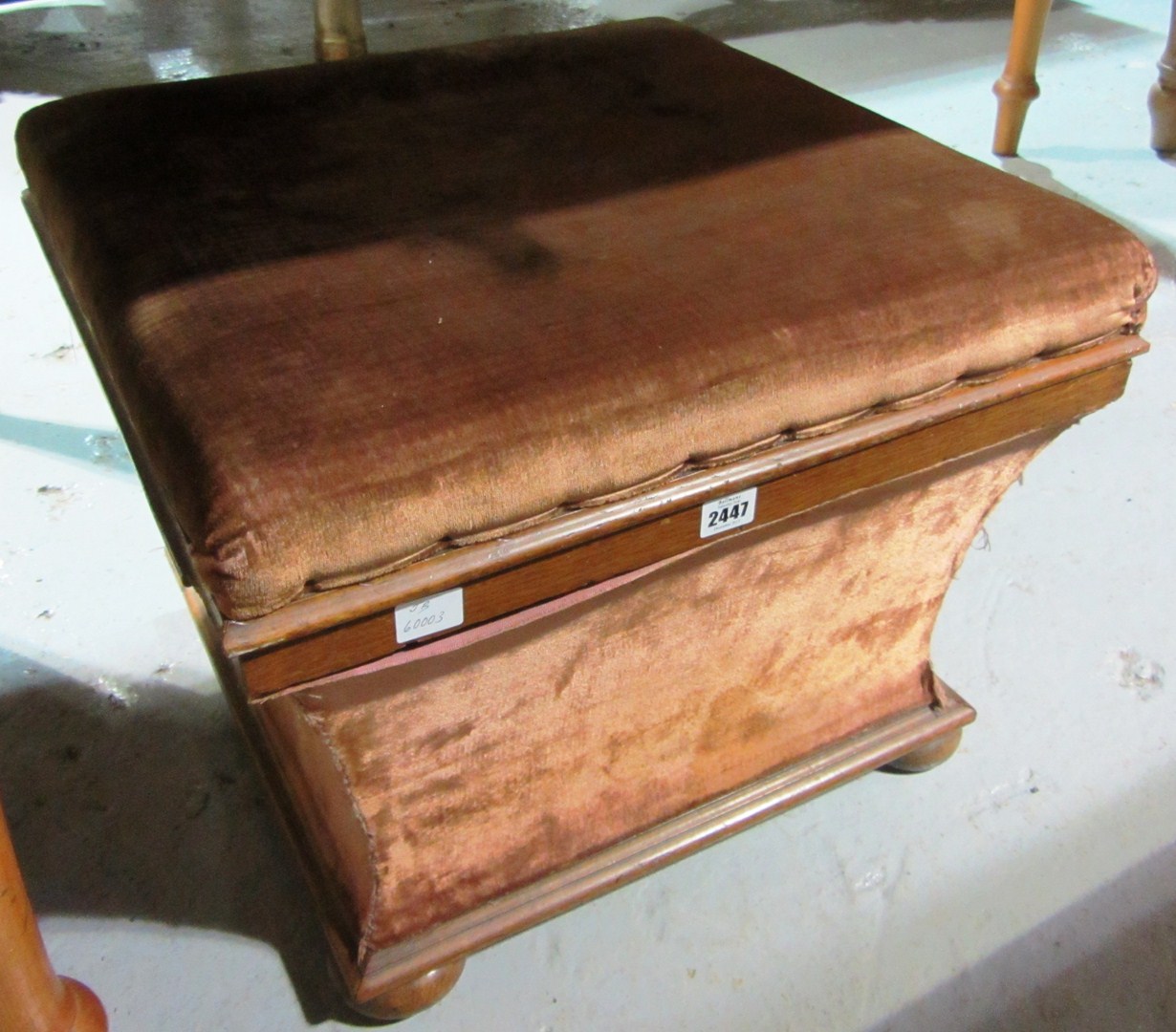 Appraisal: An oak framed ottoman of square form