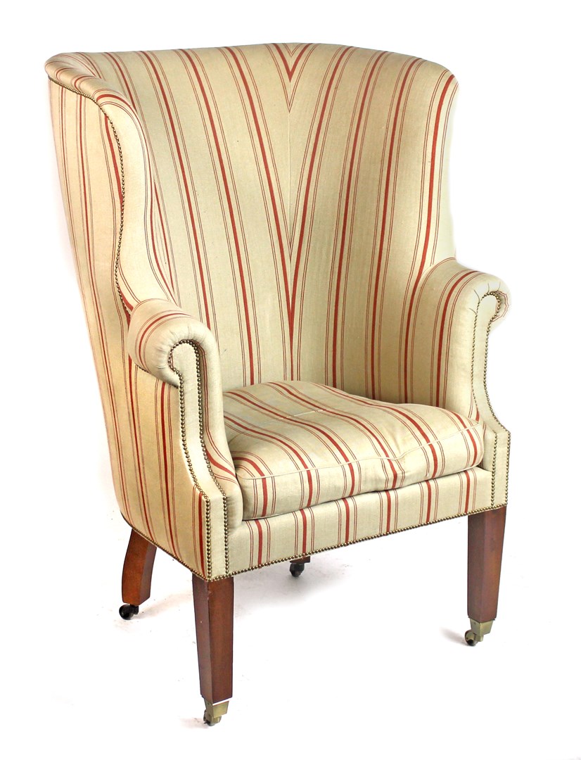 Appraisal: An th century style high tub back armchair on square