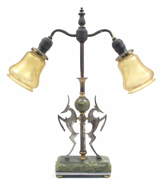 Appraisal: An Art Deco silvered brass and onyx lamp with iridescent