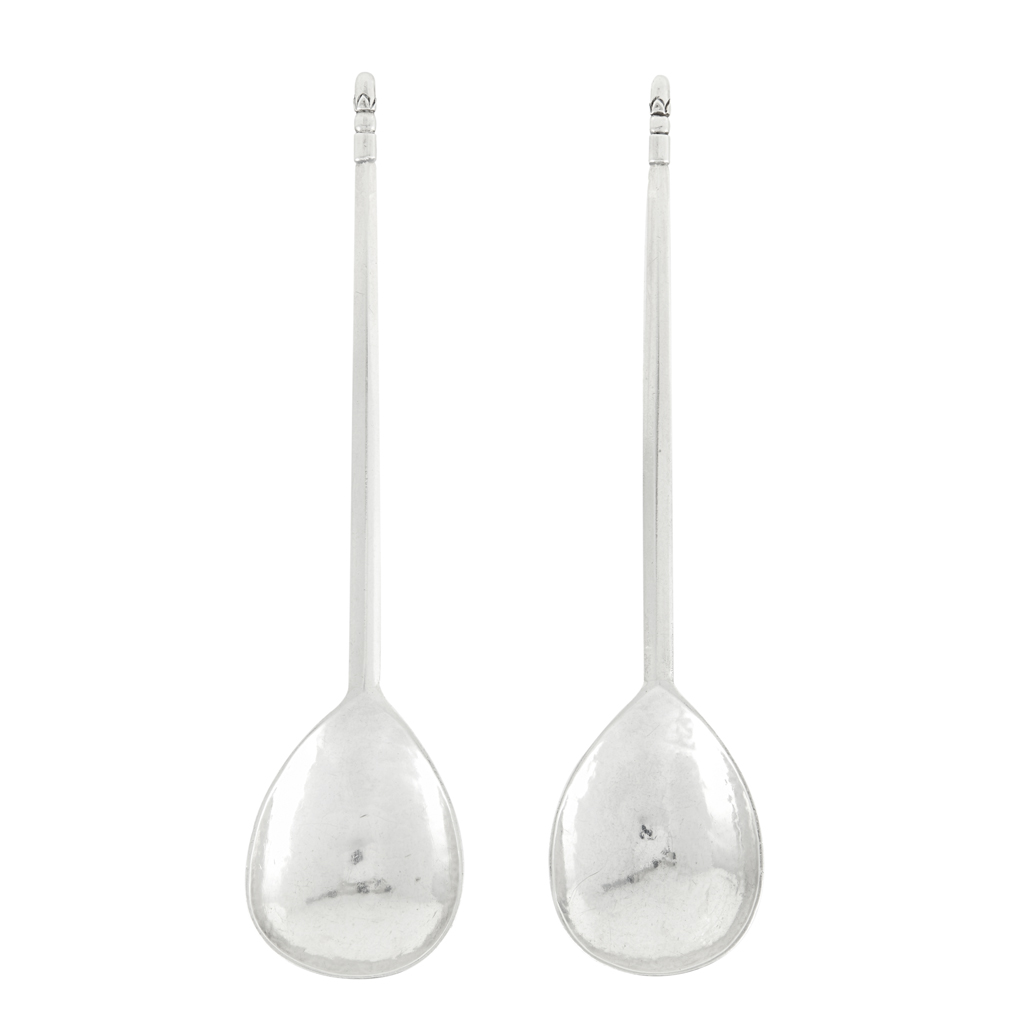 Appraisal: KESWICK SCHOOL - A pair of early th century spoons