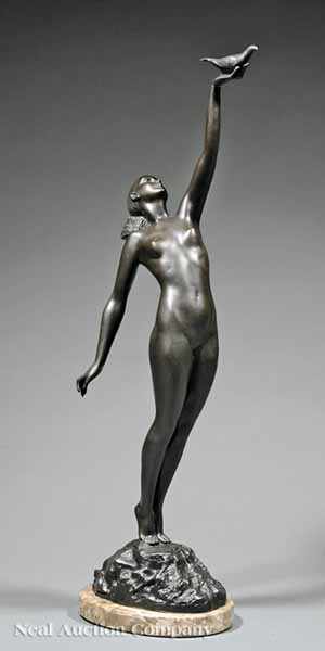 Appraisal: A French Bronze of A Young Woman Holding Aloft a