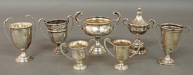 Appraisal: - Seven English silver trophies early th c largest h