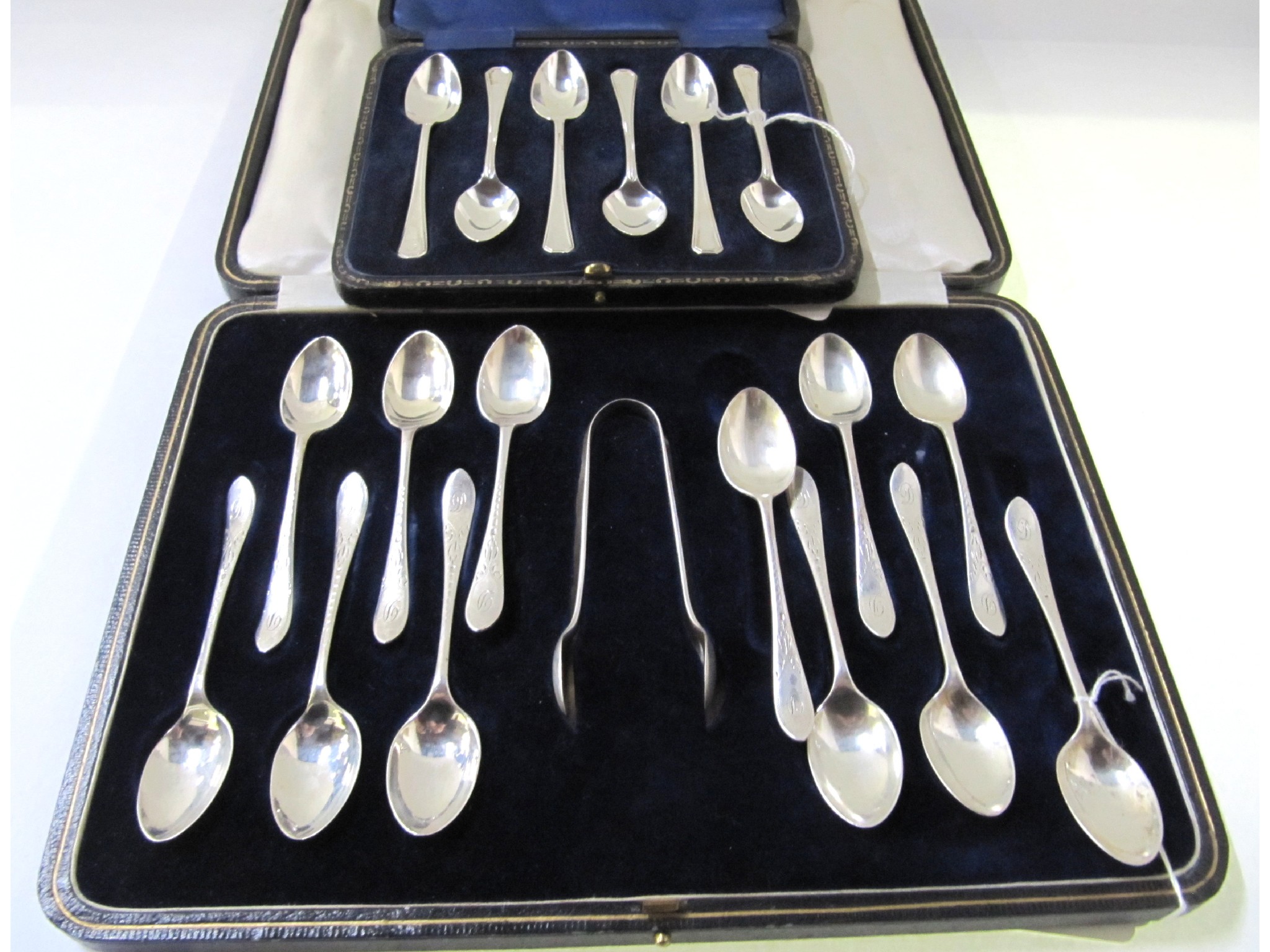 Appraisal: A lot comprising a cased set of twelve silver coffee