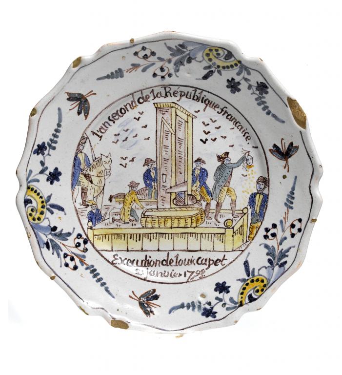 Appraisal: A NEVERS POLYCHROME FAIENCE PLATE painted with the scene of