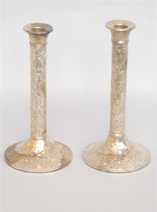 Appraisal: PAIR FINE SILVERPLATE CANDLESTICKS With overall scrolled and figural decoration