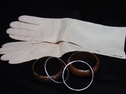 Appraisal: COLLECTION OF BANGLES AND PAIR OF GLOVES Three wide bangles