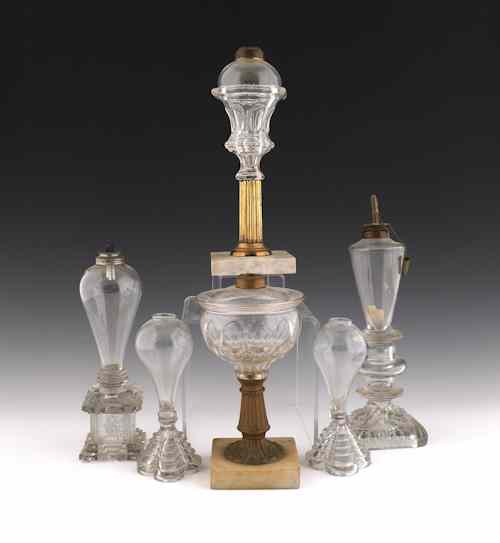 Appraisal: Six New England colorless glass whale oil lamps mid th