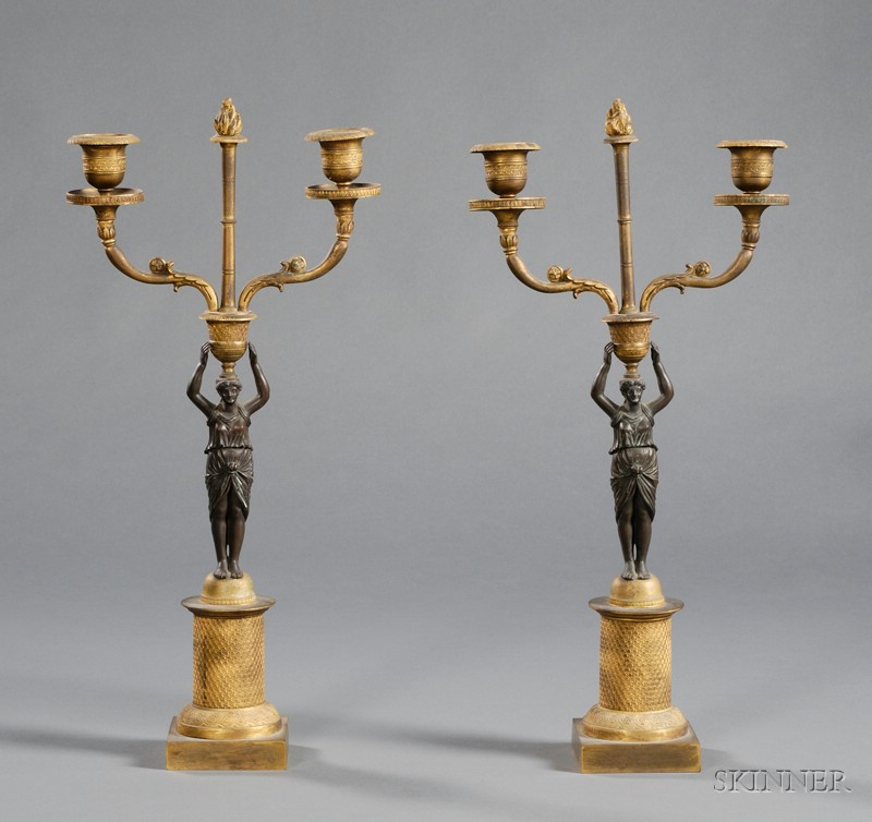 Appraisal: Pair of Empire-style Parcel Gilt Bronze Figural Two Light Candelabra