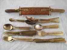 Appraisal: A canteen of bronze flatware comprising six each table spoons