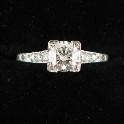 Appraisal: A diamond solitaire ring The circular cut diamond is set