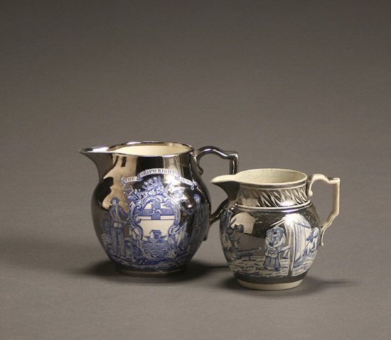 Appraisal: Two English Blue Transfer Printed Silver Lustre Jugs th Century