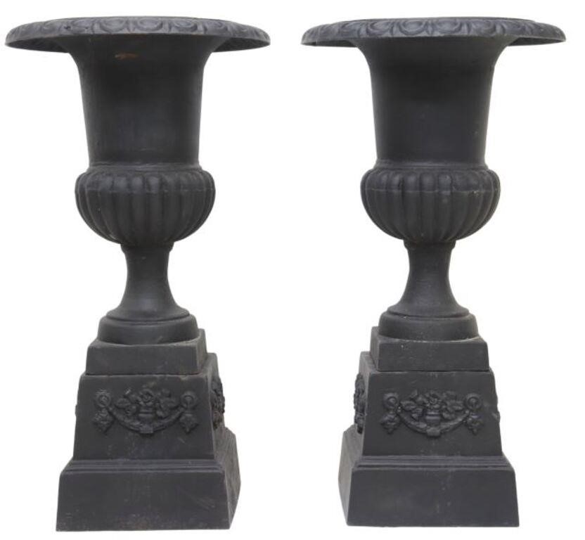 Appraisal: pair Classical style cast iron urn planters removable from iron