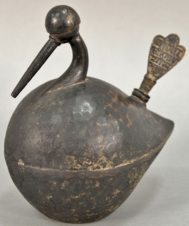 Appraisal: Bronze Persian or Eastern oil lamp hand hammered bird form