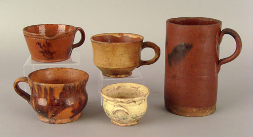 Appraisal: Four American redware mugs early th c h - h