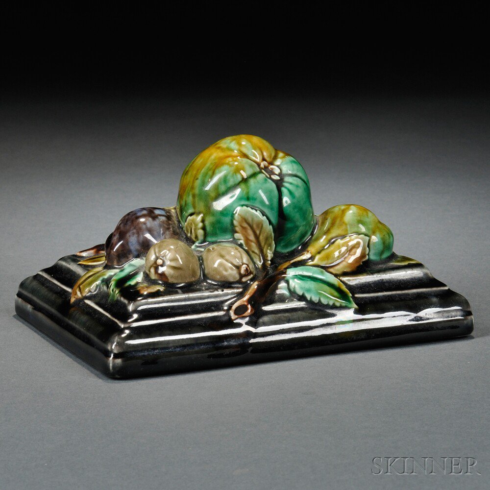 Appraisal: Rorstrand Majolica Paperweight Sweden late th century stepped rectangular base