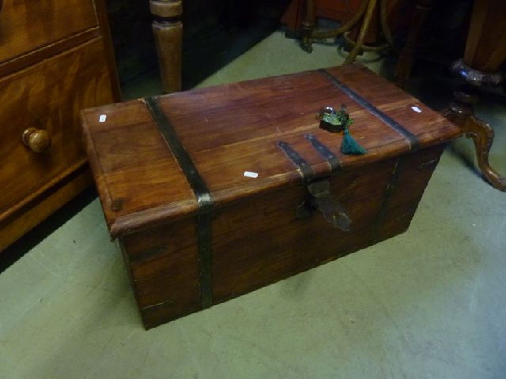 Appraisal: An Indian hardwood chest strong box with hinged lid iron