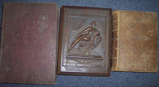 Appraisal: A photograph album the cover carved a Classical nude Foxe's