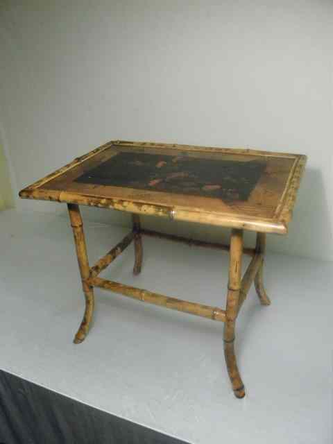 Appraisal: Bamboo inlay hand painted coffee table Inlaid geometric designs on