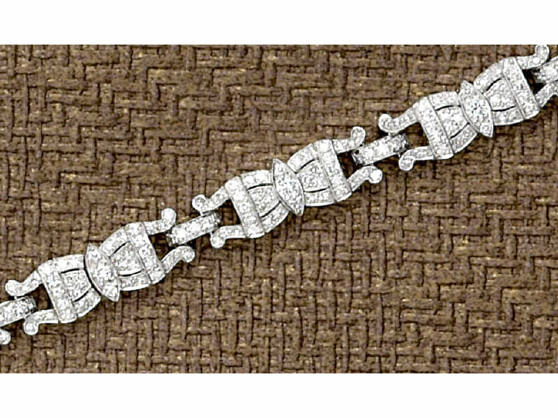 Appraisal: DIAMOND BRACELET An k white gold bracelet with filigree design