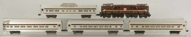 Appraisal: Lionel O-Gauge Passenger Train Set Description American Post-war Includes four