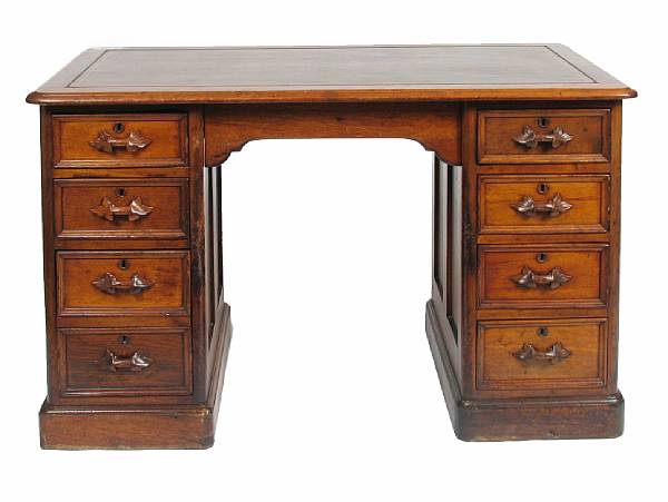 Appraisal: A mixed wood kneehole desk height in width in depth