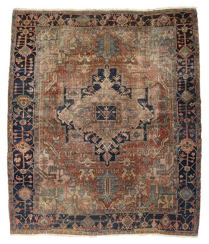 Appraisal: Heriz Carpet Persian circa salmon and blue central medallion camel