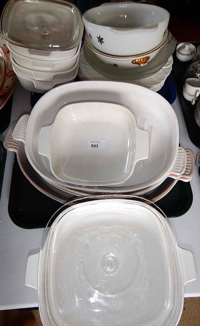 Appraisal: Four enamelled iron shallow cooking pans various cooking dishes and