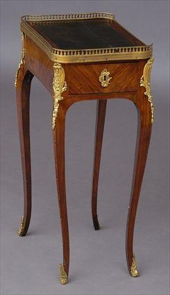 Appraisal: LOUIS XV GILT-METAL-MOUNTED KINGWOOD TABLE EN CHIFFONIERE The pierced -galleried