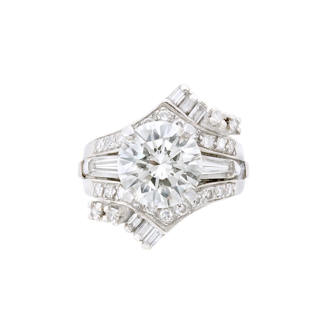 Appraisal: White Gold and Diamond Ring One round diamond ap cts